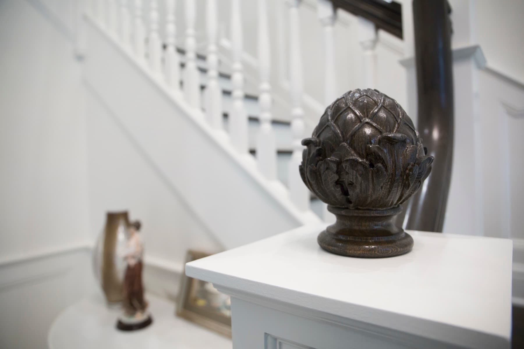 Installed staircase with oak treads and turned balusters — Caruso residence