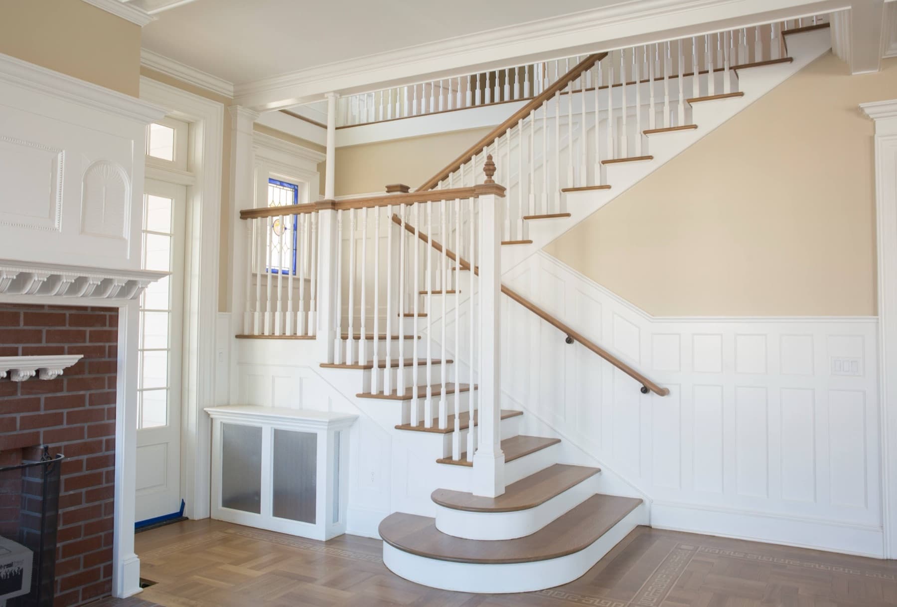Full staircase in a Whitehall foyer during the in-home tread measure.