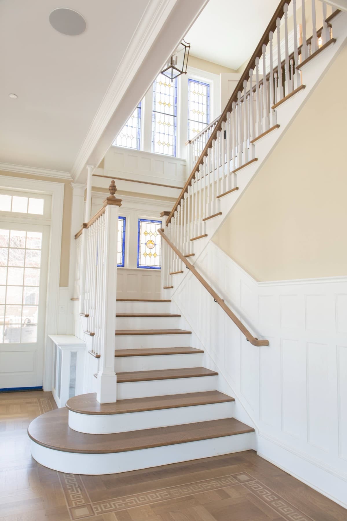 Stringer framing detail beneath a Snyder-built foyer stair