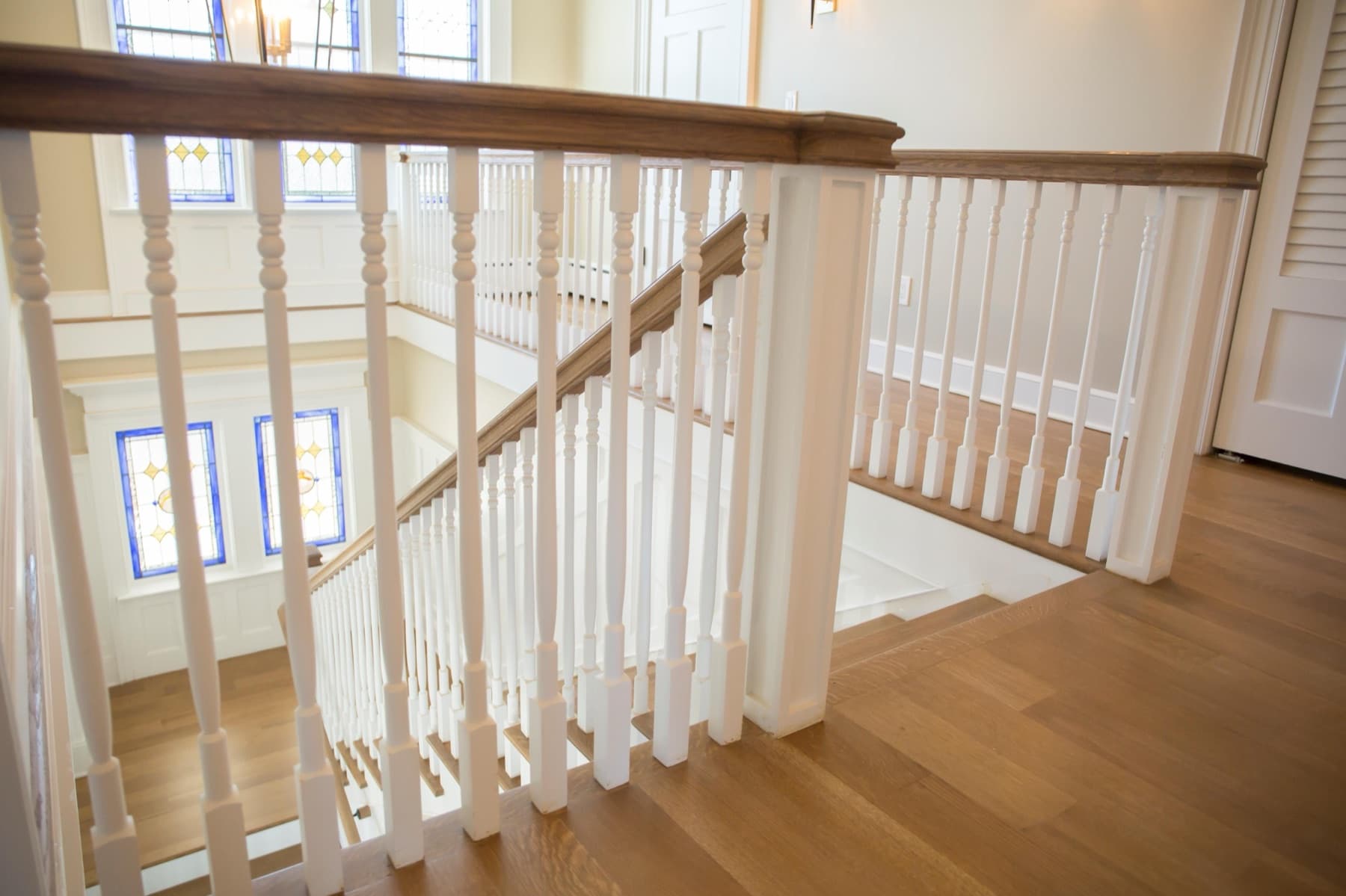 Faucett second-floor balcony railing with turned balusters
