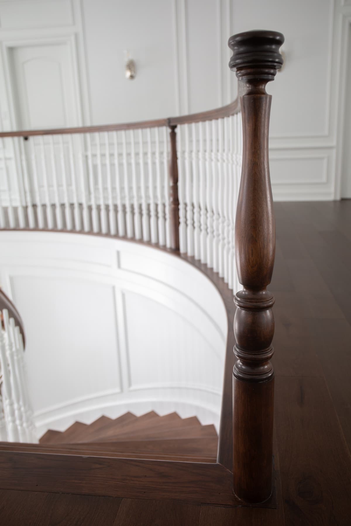 Curved stringer wrapping the foyer — Rambo residence